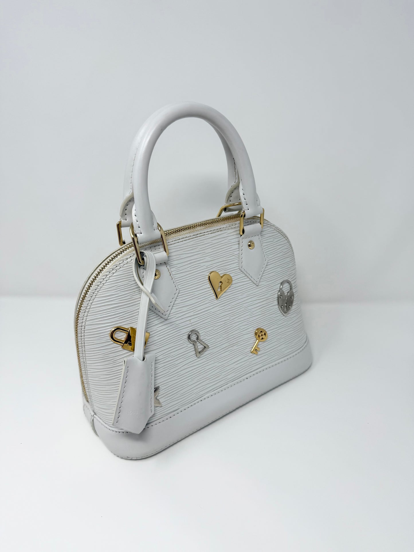 Louis Vuitton Alma BB Love Lock Epi White