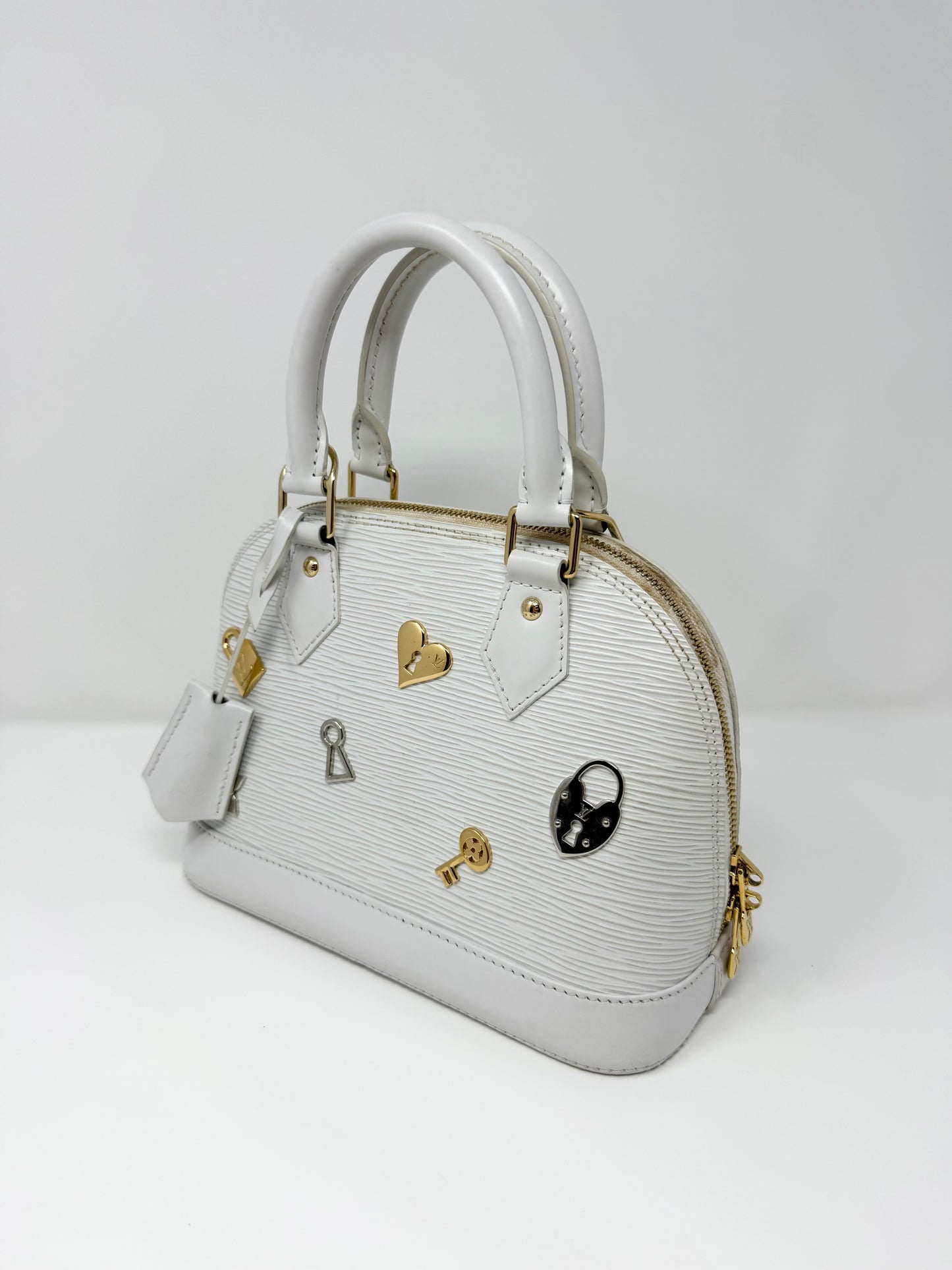 Louis Vuitton Alma BB Love Lock Epi White