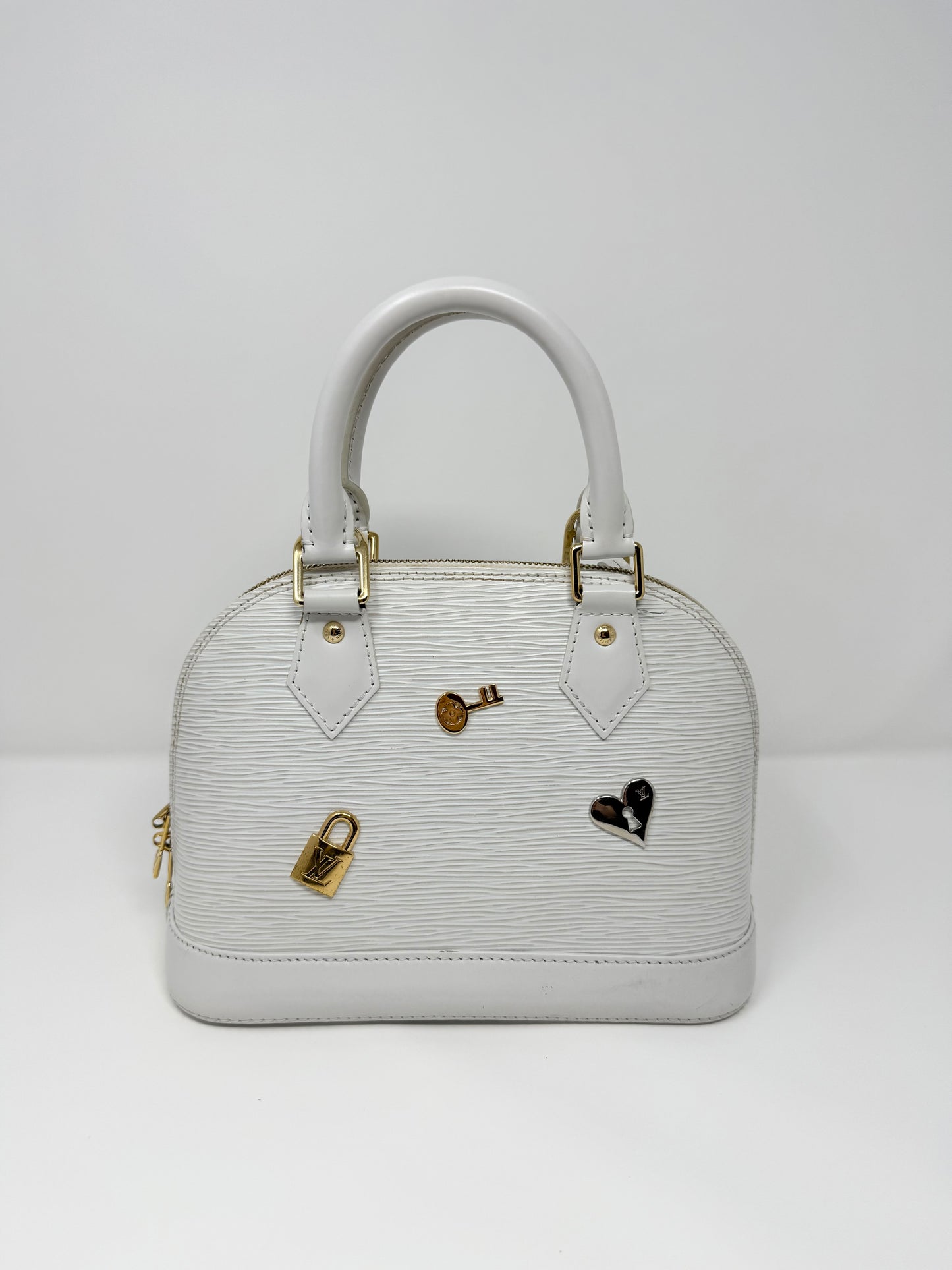 Louis Vuitton Alma BB Love Lock Epi White