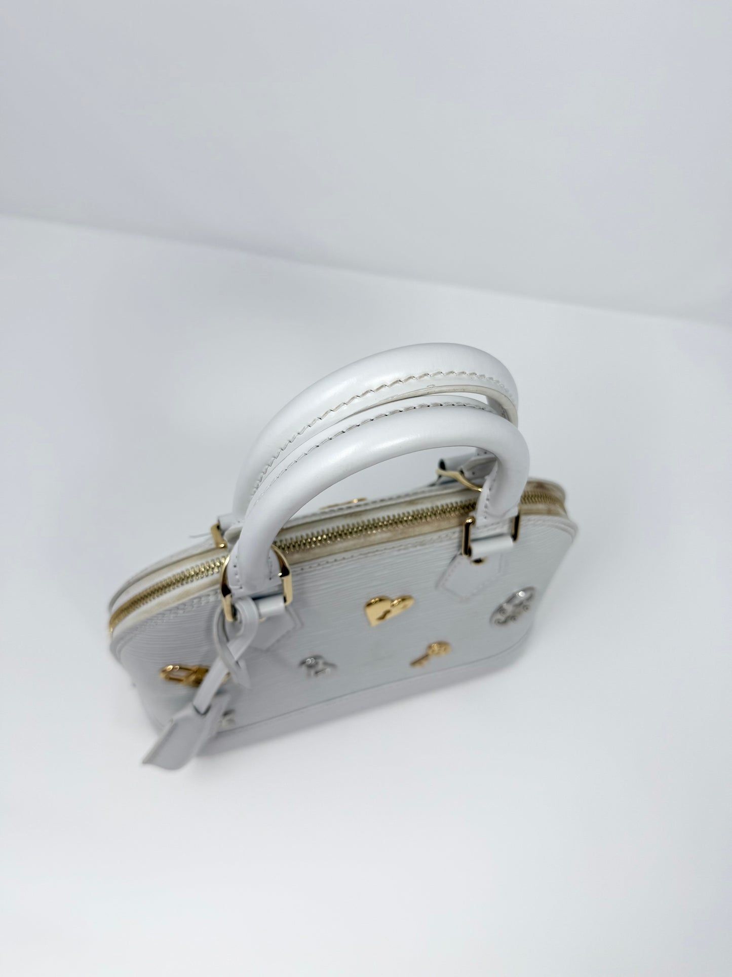 Louis Vuitton Alma BB Love Lock Epi White