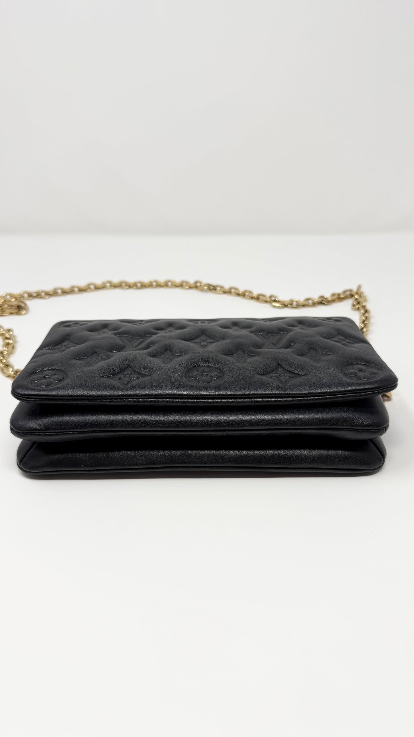 Louis Vuitton Pochette Coussin Monogram Embossed Black