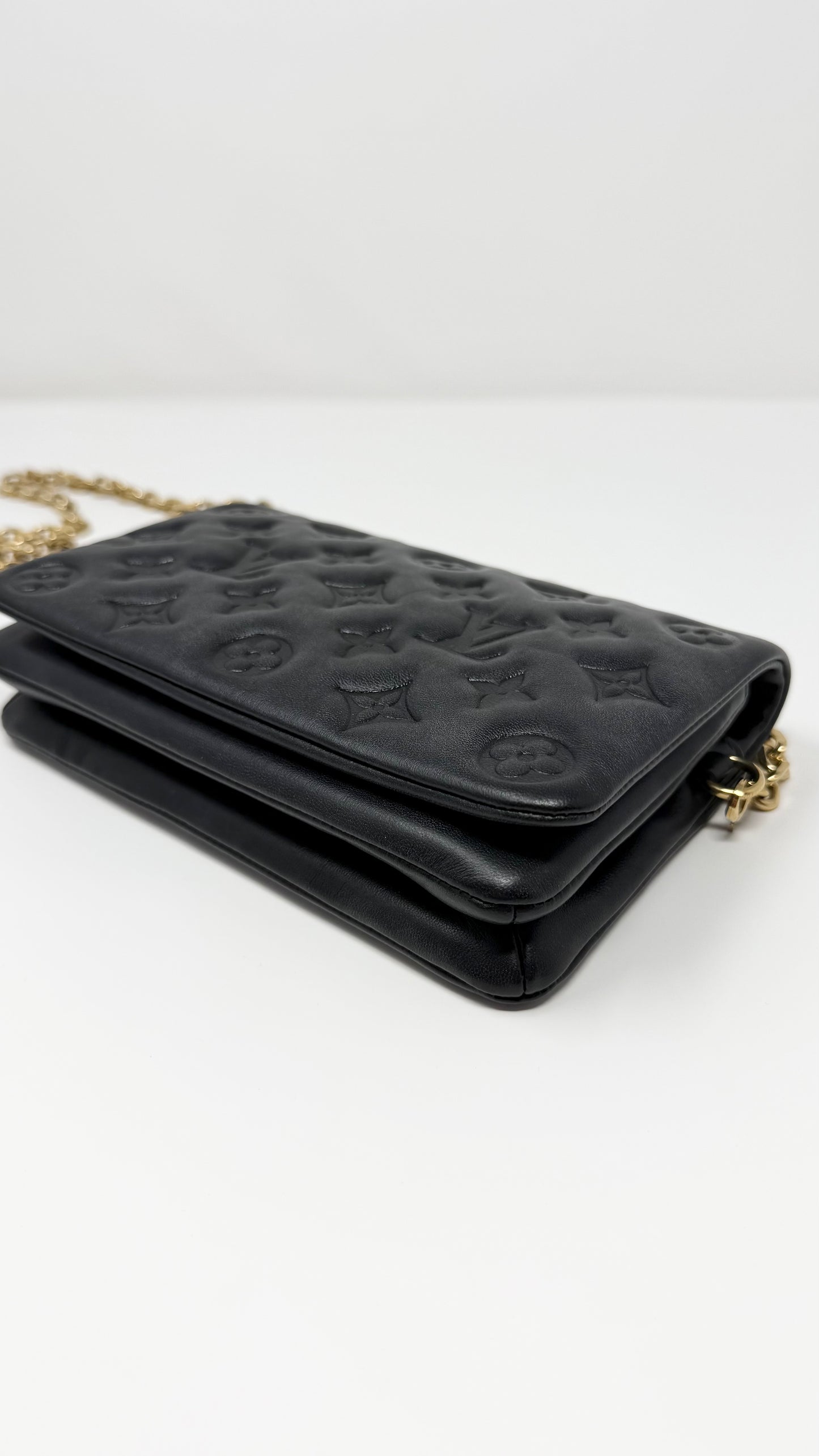 Louis Vuitton Pochette Coussin Monogram Embossed Black