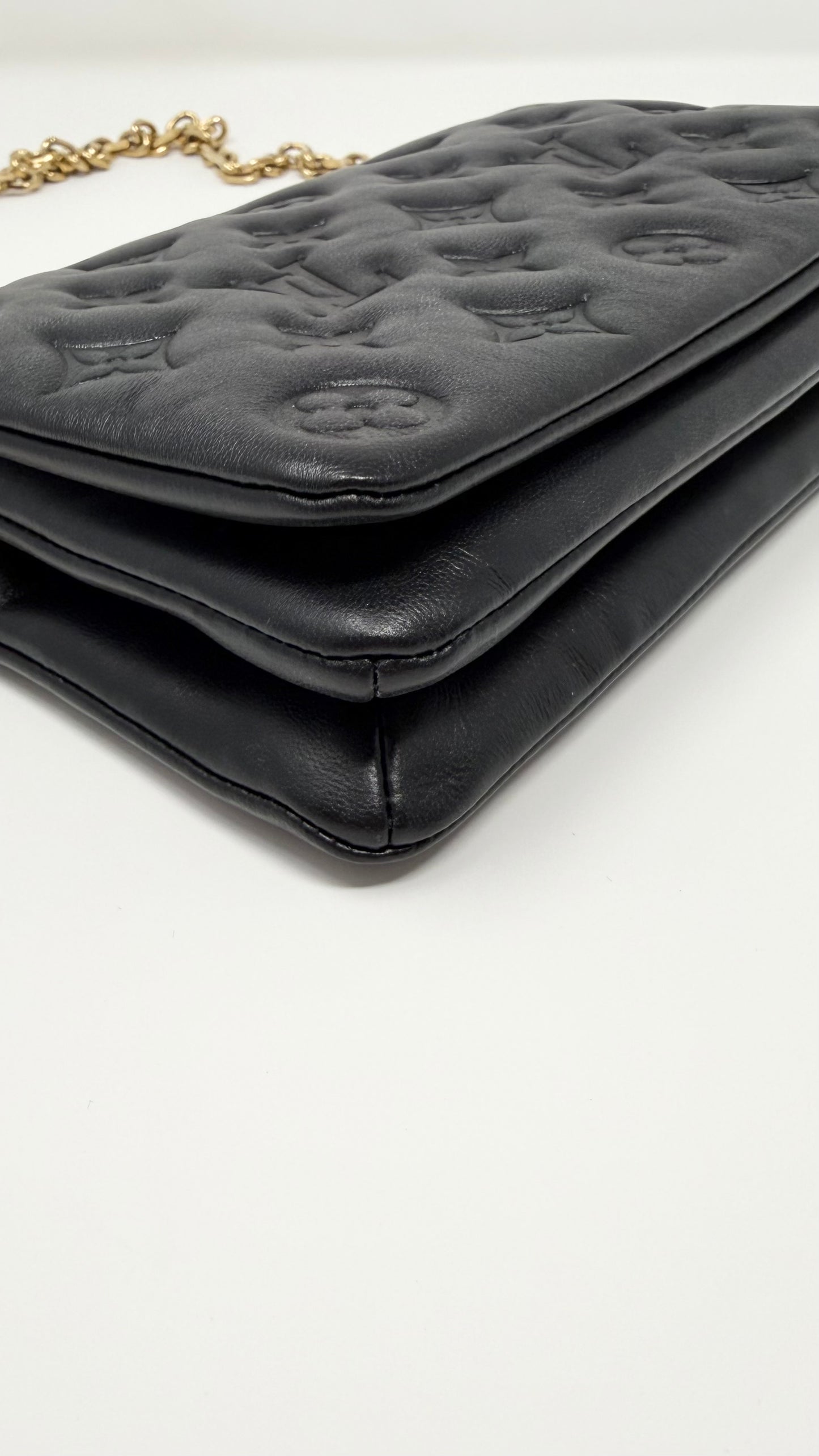 Louis Vuitton Pochette Coussin Monogram Embossed Black