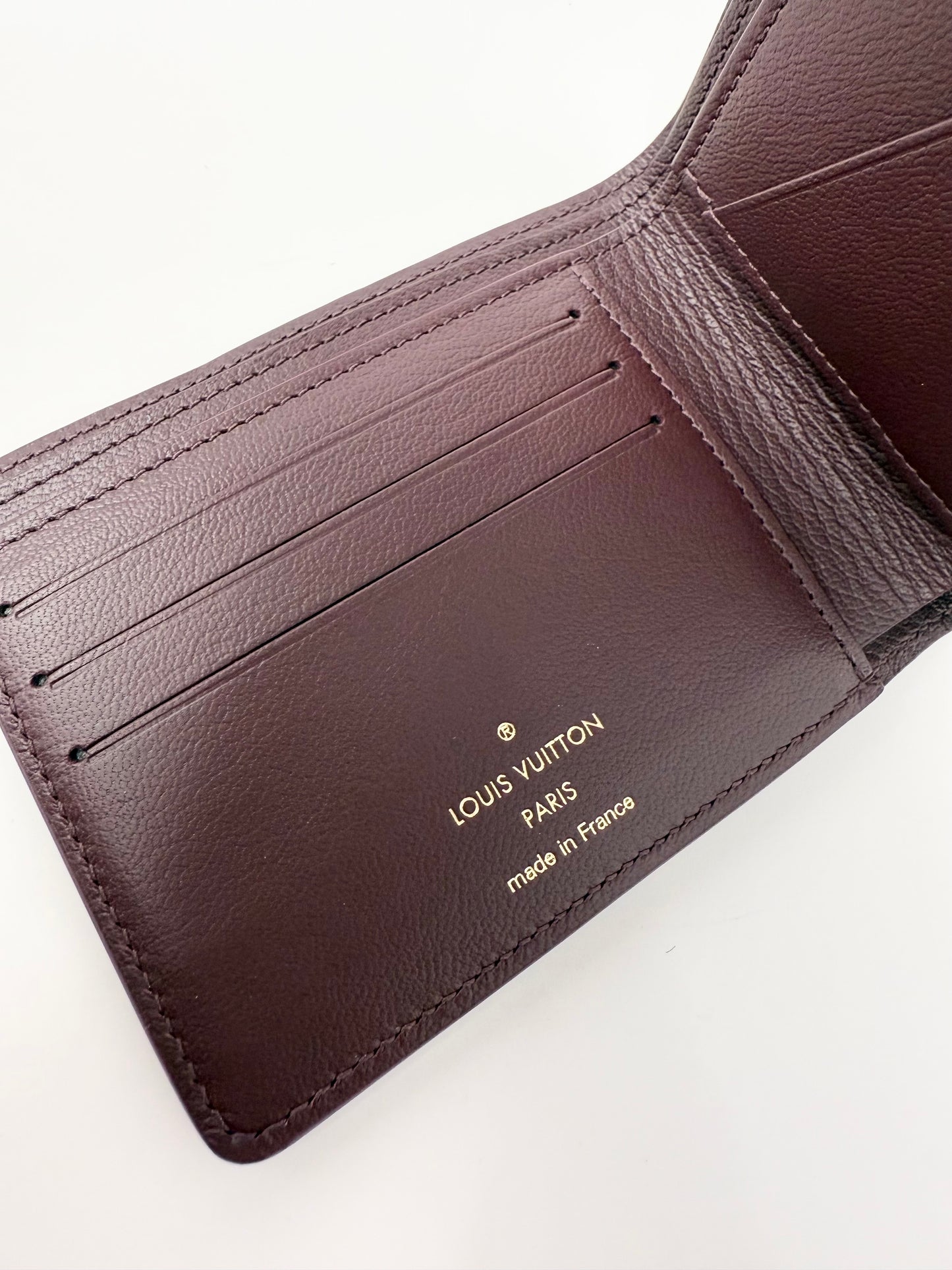Louis Vuitton Pharrell Ostrich Bifold Wallet Card Holder Bordeaux Burgundy